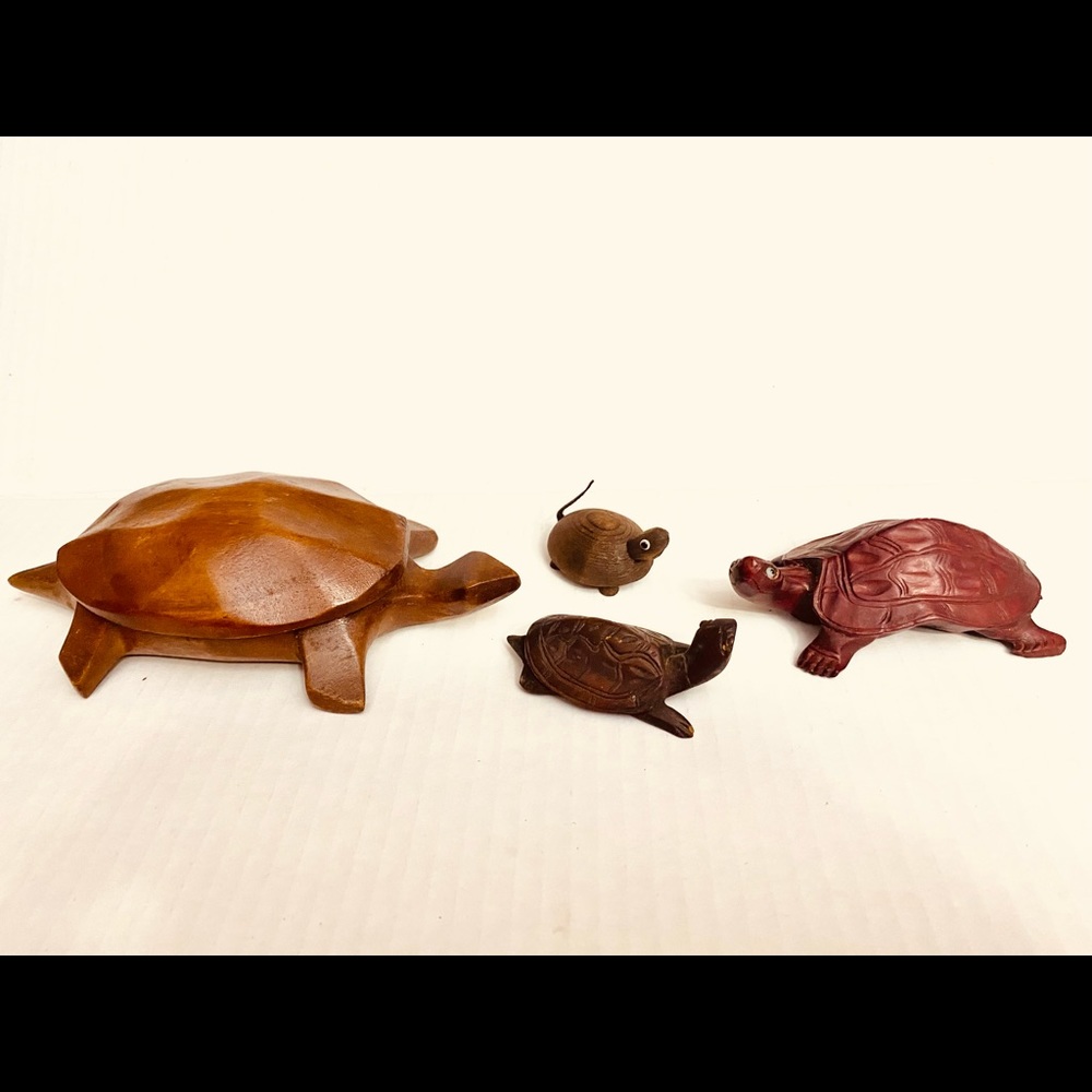 4 wood‎ carved turtles